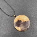 Aventurine stone round pendant necklace with gold metal frame and black cord strap - Dream Stone