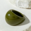 Minimalist dark green acrylic ring on white natural stone base with elegant smooth finish - Dark Green(31759)