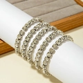 Nahaufnahme eines 6er-Sets silberner Tennisarmbänder mit klaren Kristall-Strasssteinen - Silber 6-teiliges Set Runde Strass (31397-bra-S-EP)