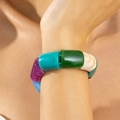Close-up of colorful acrylic beaded elastic bracelet with marble texture worn on wrist - Cylindrical Multicolor Beaded (31737-bra-colour)