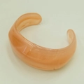 Retro acrylic open cuff bracelet in peach pink with a minimalist bohemian geometric design - Peach Pink