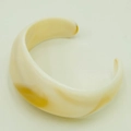 Retro ivory acrylic open bangle with amber marble texture in a minimalist geometric style - Beige/Ivory