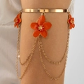 Detail of gold flower arm cuff with orange petals and cascading metal fringe tassels - Orange Flower Tassel Open Arm Cuff (29847-bra-Gora-3-EP)