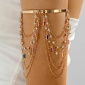 Λεπτομέρεια από boho χρυσό περιβραχιόνιο με πολύχρωμα κρύσταλλα και φούντες στρας - 29847-bra-G-6-EP