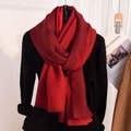 Winter faux cashmere scarf with red color-block design and ribbed knit texture on a model - Dark Red