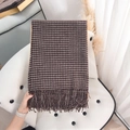 Brown and cream houndstooth faux cashmere scarf with fringe tassels on a soft leather chair - Dark Gray