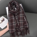 Dark brown plaid scarf with white and green accents and long fringe on a leather background - Dark Coffee