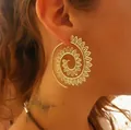 Detail of large gold spiral leaf earrings showing bohemian hollow-out craftsmanship - Spiral Leaf Style (4510-gold)