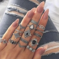 Close-up of 15-piece vintage silver bohemian midi ring set with blue gemstones and floral motifs - 13-Piece Vintage Bohemian Style (Silver Special)