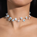 Detailansicht des Evil-Eye-Chokers mit blauen Augenmustern und goldenem Metalldraht - Böser Blick Ethno Choker (28684-colour)