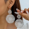 Close-up of bohemian hollow mandala silver earrings with intricate geometric pattern - Floral Silver (30774-ear-S)