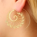 Bohemian gold spiral drop earrings with intricate filigree texture shown on model - Gold Fan Filigree Style (4580 Gold)