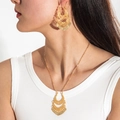 Bohemian gold hollow crescent jewelry set featuring tassel earrings and necklace on model - Gold Hollow Crescent Necklace Earrings Set (9199-suit-G)