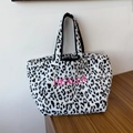 Black and white leopard print fleece tote bag with pink Healer embroidery and black straps - White Leopard Style (HEALER)