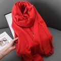Thick red cashmere-feel winter scarf featuring dense fringe tassels and soft knit texture - Red