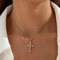 Macro detail of gold cross pendant with marquise stones worn on the collarbone - Marquise Rhinestone Cross Necklace (21356)