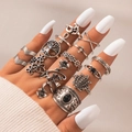 Bohemian silver ring set with vintage floral and feather designs on model fingers - Bohemian Tree of Life Vintage Silver (6391)