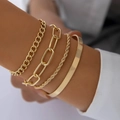 Golden chunky chain bracelet set including curb and paperclip chains worn on wrist - Cuban Chain And Paperclip Chain Four Piece Gold Bracelet Set (16298)