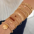 Gold multi-layer beaded bracelet set with coin pendant shown on model wrist - Gold Multi-layer Coin Pendant Bracelet Set (30957-bra-G-EP)