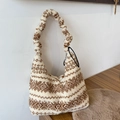 Detail of winter drawstring shoulder bag in beige fleece with ethnic geometric pattern - Khaki Ethnic