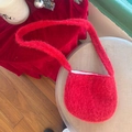 Plush red semi-circular crossbody bag featuring a thick faux fur texture and matching strap - Red Plush Semi-circle Crossbody Bag