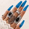 5-piece vintage bohemian silver ring set with turquoise and black gemstones on model - Vintage Bohemian Black Stone Carved Style (17196)