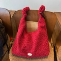 Burgundy plush knitted tote bag with handmade label and unique knot handle detail - Angola Red
