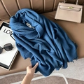Pleated royal blue cashmere-like scarf with fine fringe tassels on a leather background - 67cmx180cm / Denim Blue