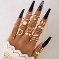 Set of 20 golden geometric rings including snake and butterfly designs for layered styling - Gold (25576-gold)