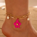 Detail of double-layered gold anklet with magenta and white flowers on beach background - Gold Rose Red Flower Style (30208-ank-G rose)
