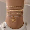 Detail of four-piece layered anklet with gold leaf, rhinestones, and starfish charm - Starfish White Beaded Rhinestone Leaf Anklet (21255-1)