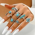 Boho style silver ring set with turquoise stones featuring feather and sun designs - Ethnic Mix Turquoise Feather Style (26655-silver)