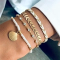 4pcs Bohemian style anklet set with gold shell pendant and white beaded rope design - 4-Piece Bracelet (21255-A-G)