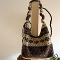Winter faux shearling shoulder bag with brown geometric patterns and rope strap - Brown Yellow Ethnic