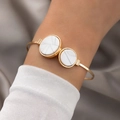 Elegant gold open cuff bracelet featuring two circular faux marble stones on grey satin - Double Round Marble Pattern Open Bangle (21601-1G)