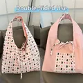 Detailed comparison of reversible tote bag with bear pattern and pink solid side - Beige Heart Rabbit Reversible Quilted