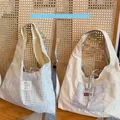 Wendbare Einkaufstasche aus Canvas mit blauem Karomuster und großer Kapazität - Beige Karo Wendbare Westentasche