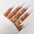 Detail of 10-piece gold ring set featuring butterfly, flower and leaf cutout designs - Gold (22708-G)
