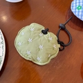 Green apple shaped protective earphone case with white flower embroidery and black lanyard - Green Flower Embroidered