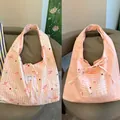 Pink reversible shoulder bag with cute cartoon bear pattern and striped bubble texture - Pink Westie Dog Reversible Stripe