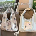 Double-sided shoulder bag with cute bear print and white bubble texture pattern - Blue Sunglasses Dog Reversible Solid