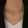Golden Evil Eye necklace with vertical bar pendants shown on a model neck - Gold Necklace (23146-G) / Gold
