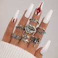 7-delige gothic punk ringen set met vlinder- en schedelmotieven in vintage zilverlook - 7-Delige Lippen Schedel Zonnegod Stijl (23432-silver)