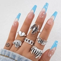 Gothic punk silver ring set featuring skull butterfly and scorpion designs on hands - 6-Piece Skull Butterfly Scorpion Style (22880-silver)