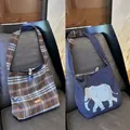 Reversible tote bag showing vintage plaid wool and blue printed canvas sides - Blue and Coffee Plaid Elephant Woolen Crossbody Bag