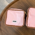 Pink nylon cosmetic storage bag with brown trim and Hope label for travel - Small / Pink