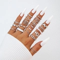 Silver multi-piece ring set featuring pearl accents and minimalist crossover designs - Silver (25304-silver)