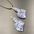Blue sodalite stone axe pendant necklace with black cord and silver clasp detail - Blue Spot Jasper
