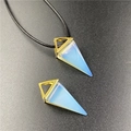 Minimalist white opal triangle pendant with gold trim on a black cord necklace - Opalite (Synthetic)
