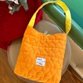 Quilted orange heart pattern crossbody bag with yellow straps and HOPE FUTURE label - Bright Orange Heart Quilted Reversible Style